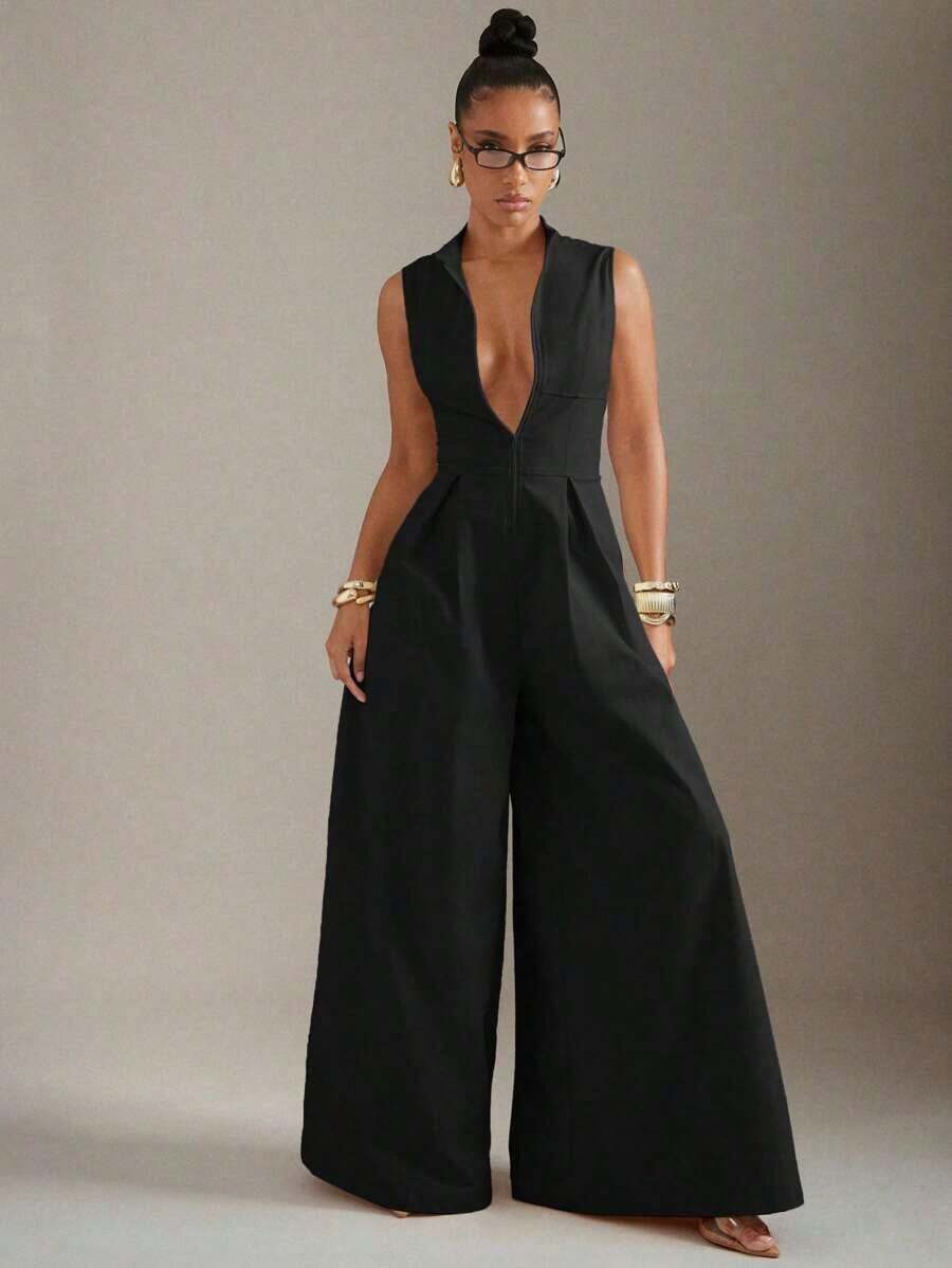 black sleeveless white zip front wide leg jumpsuit