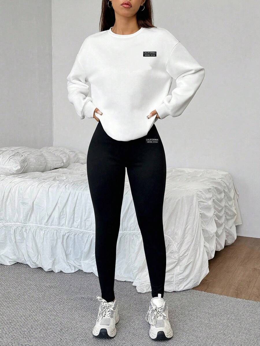 pure white crew neck sweatshirt and black leggings set