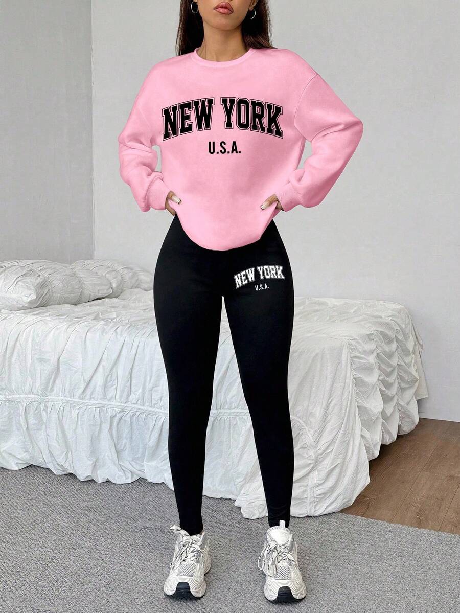 pink crew neck sweatshirt and black leggings set