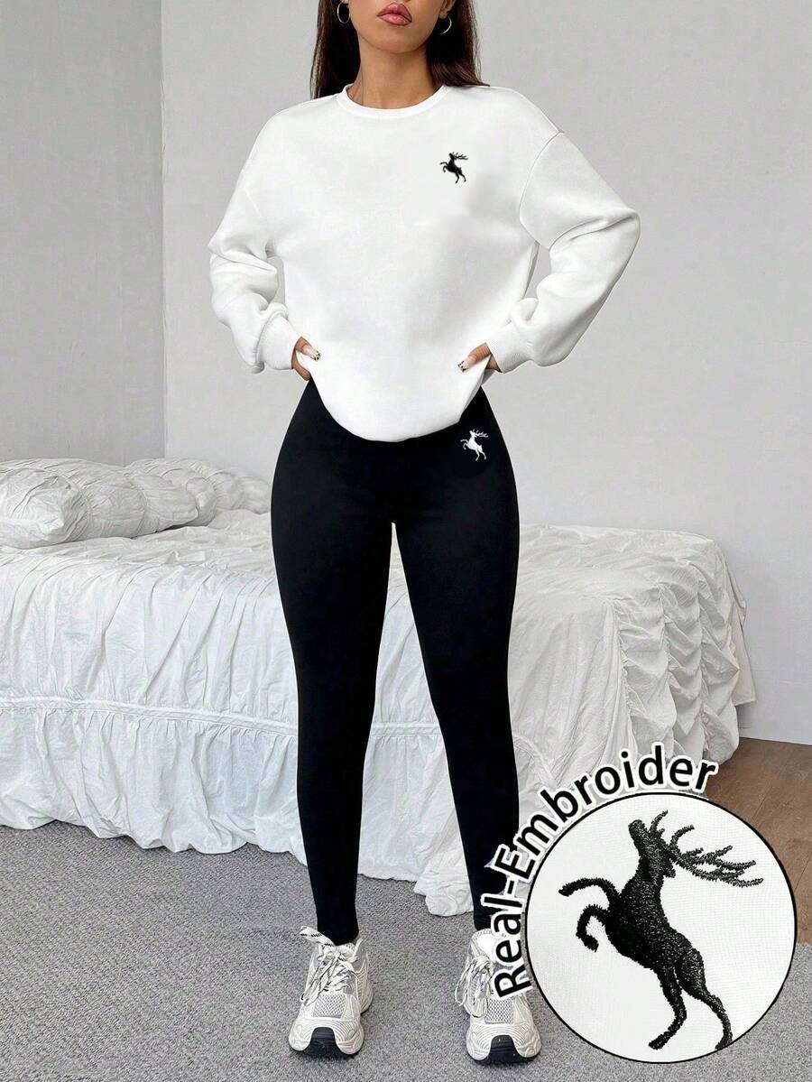 off white crew neck sweatshirt and black leggings set