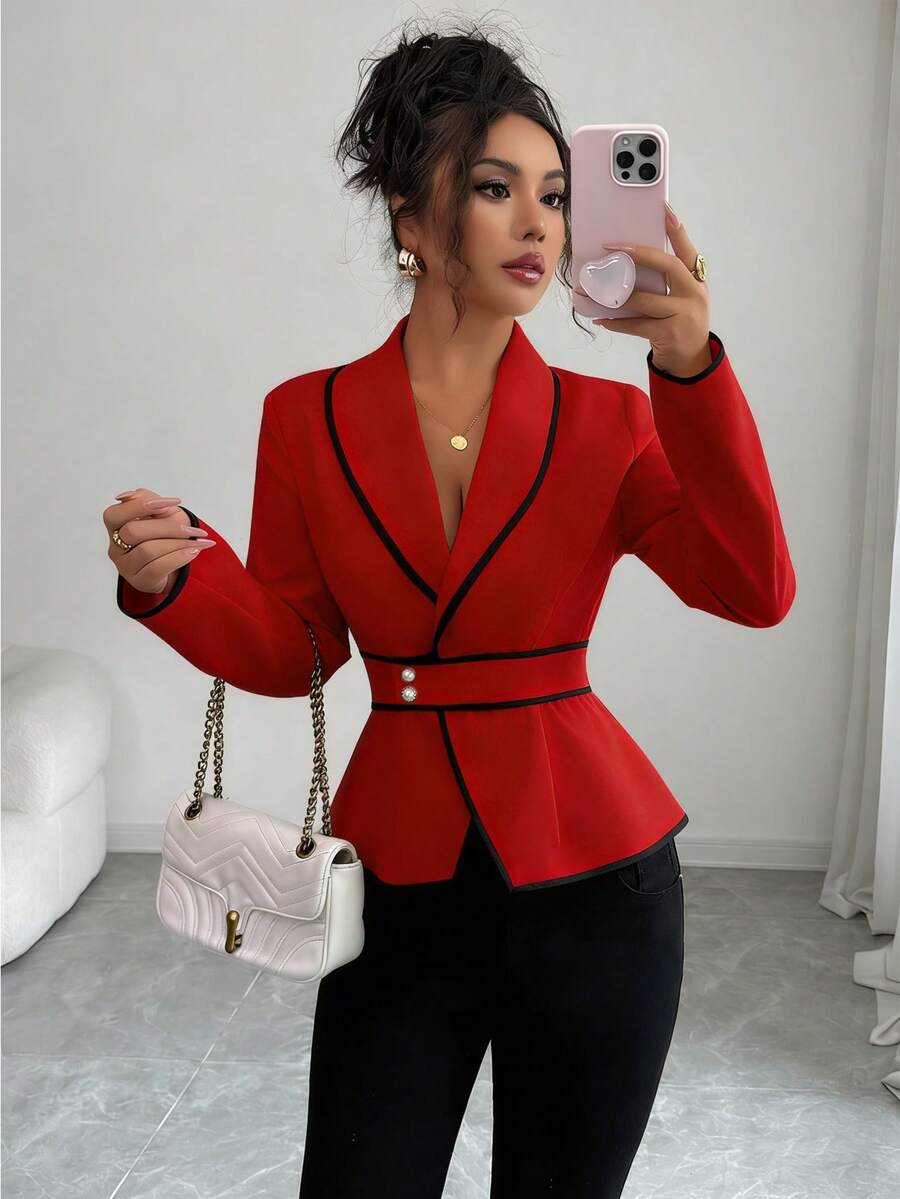 red cinched waist blazer with black piping