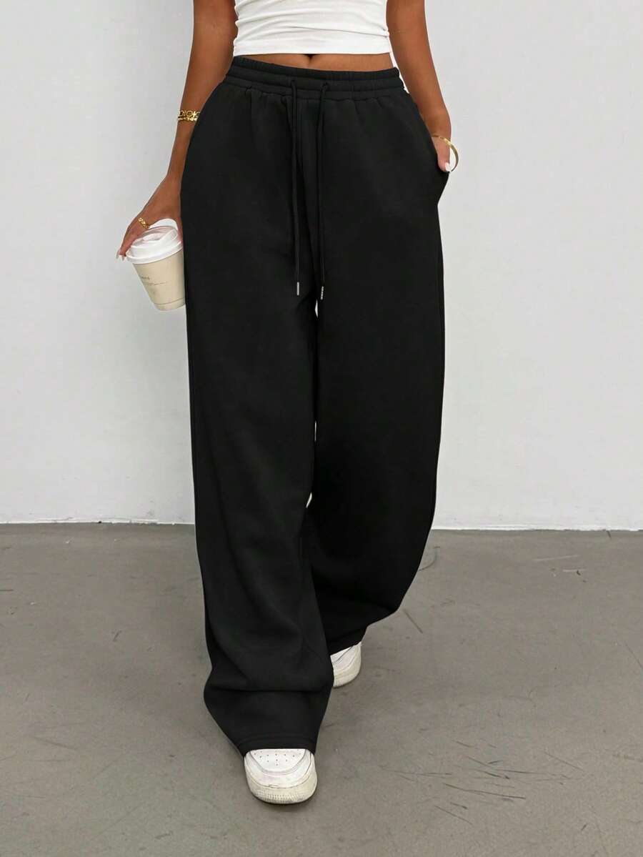 solid black ny embroidered loose fit sweatpants