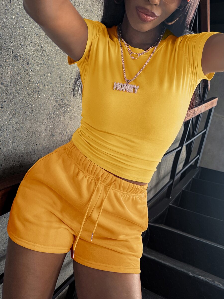 solid yellow short sleeve crew neck top