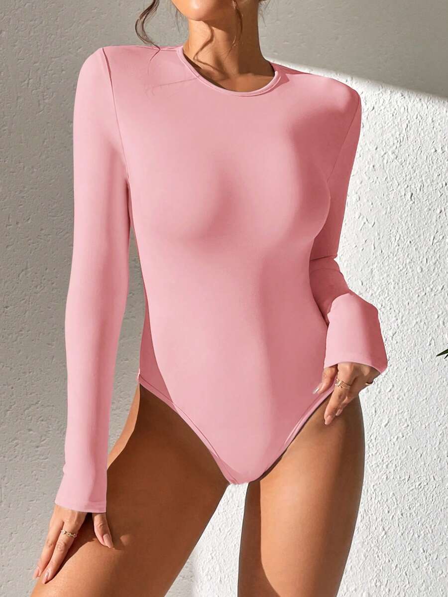 light pink long sleeve slim fit bodysuit