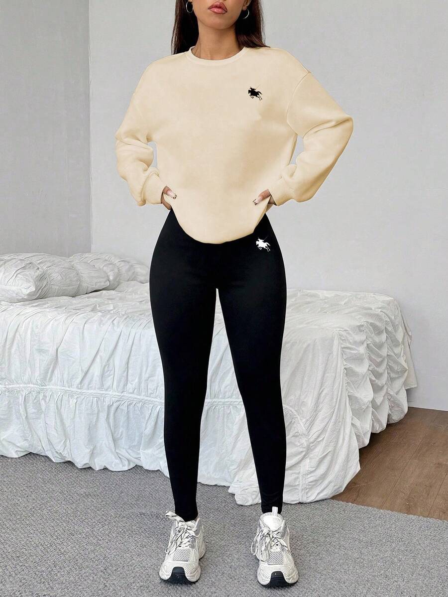 apricot crew neck sweatshirt with embroidered logo