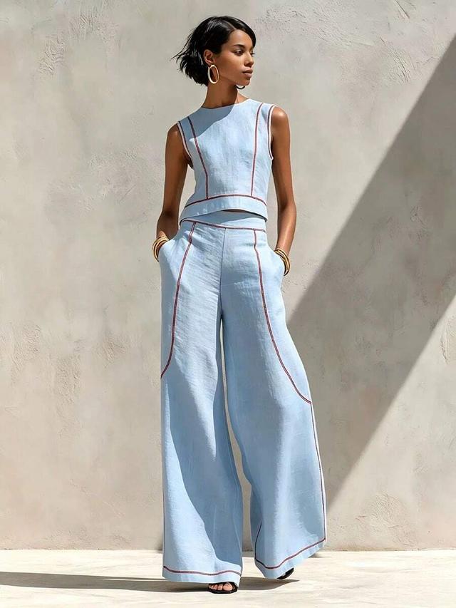 light blue sleeveless vest top and wide leg pants set