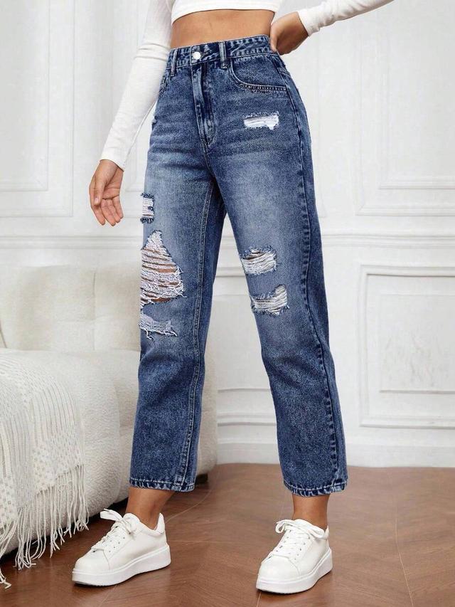 dark blue high waisted ripped mom jeans
