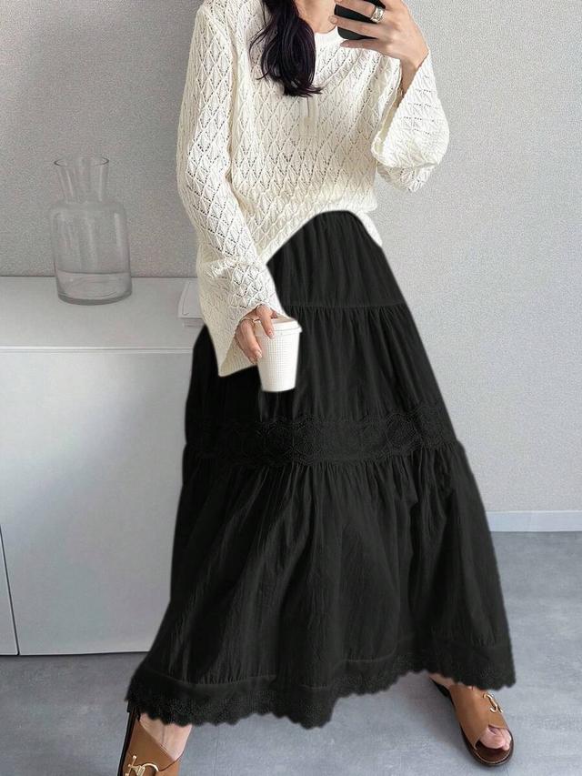 black cotton tiered skirt with lace patchwork detailing