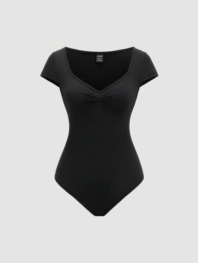 black minimalist short sleeve bodysuit