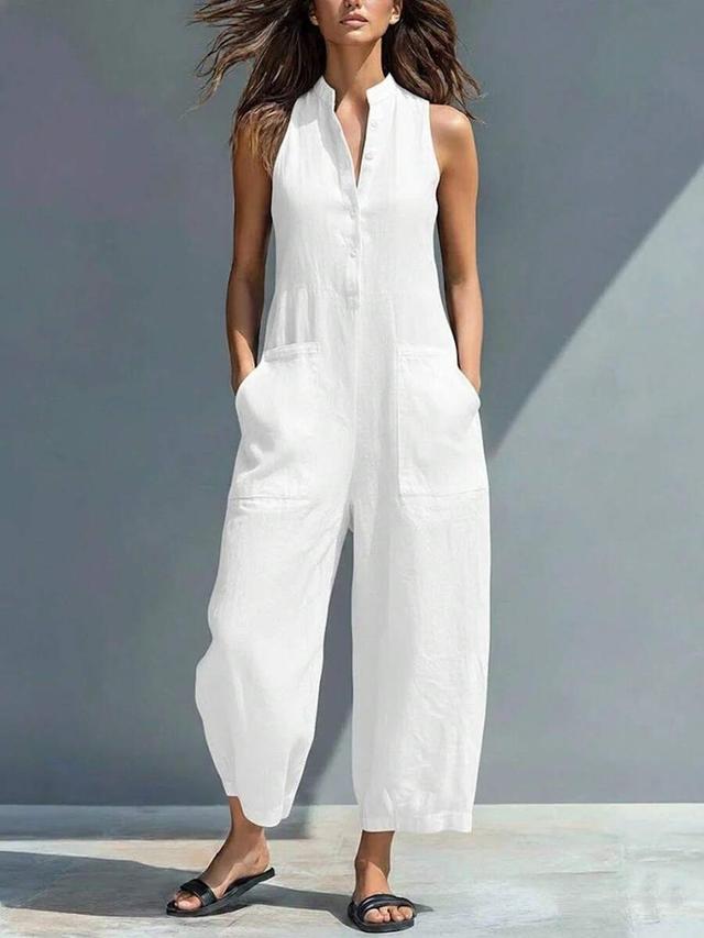 white sleeveless linen jumpsuit with button placket