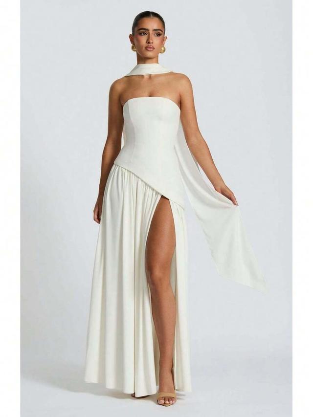 white strapless gown with asymmetric draped bodice