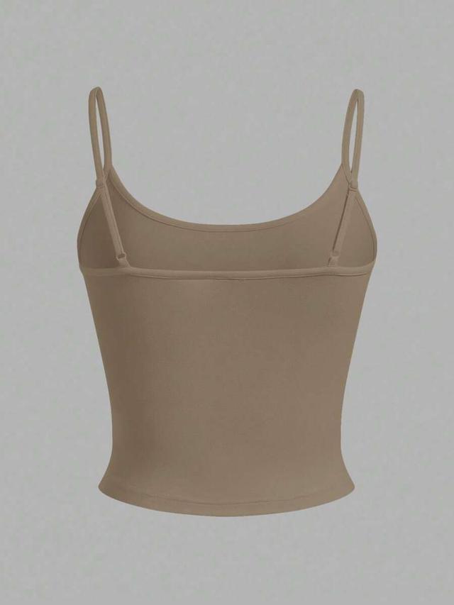 beige set of four cropped tight fit cami tops