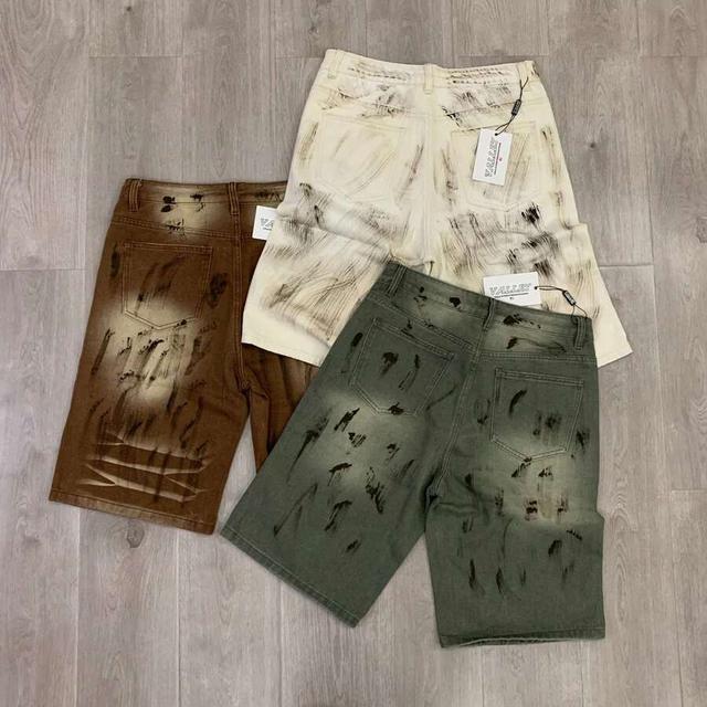 cream distressed denim jorts with rhinestone lettering