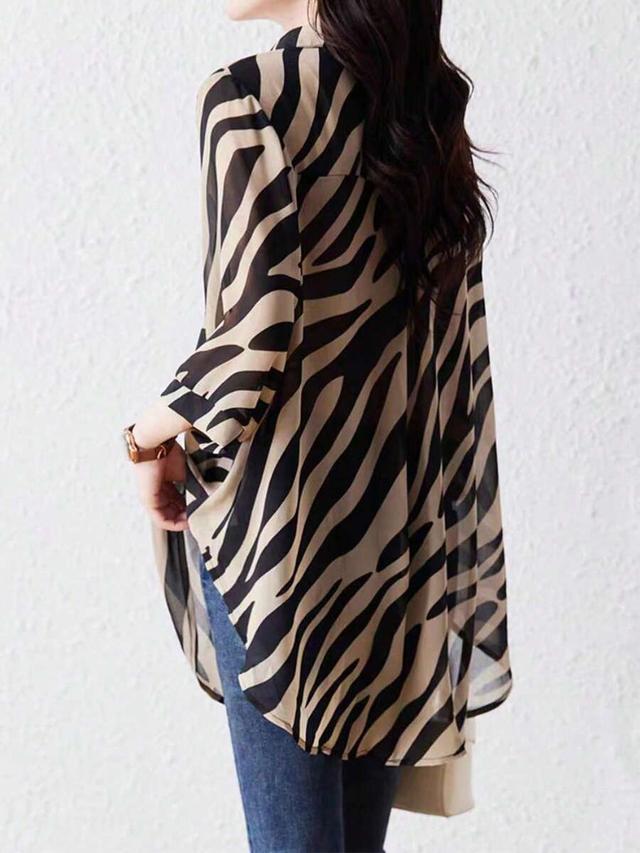 beige and black zebra print loose fit blouse
