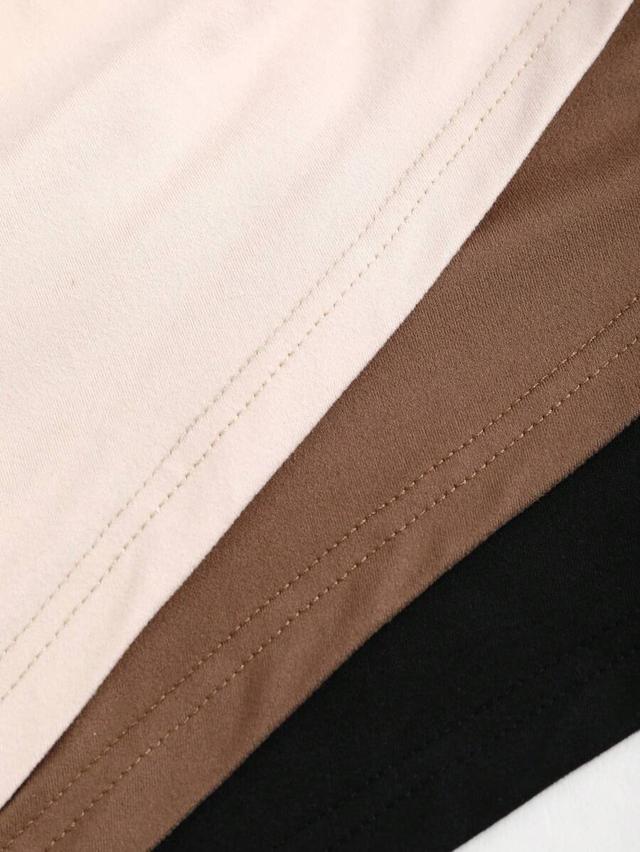 black three asymmetric shoulder pleated top in beige brown black