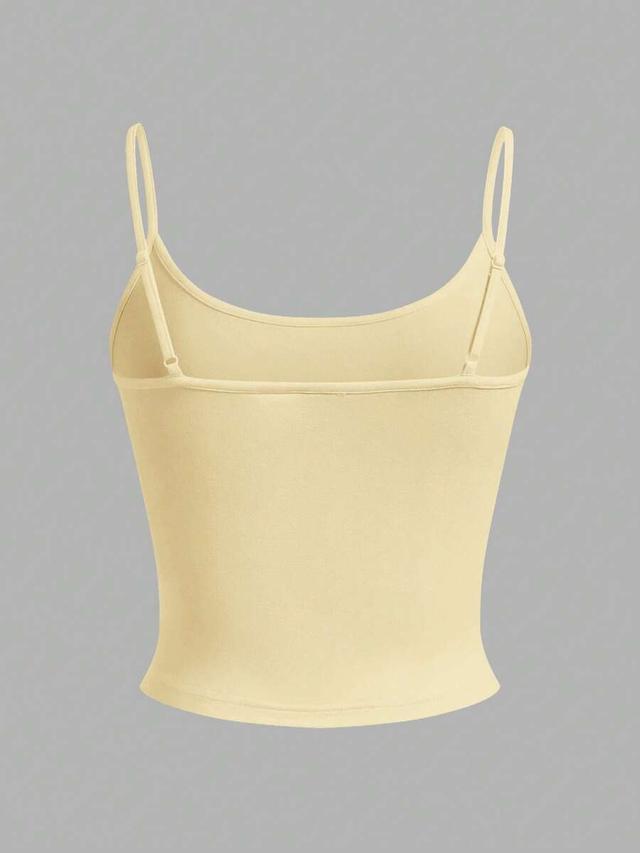 pale yellow tight fitting cropped casual camisole set