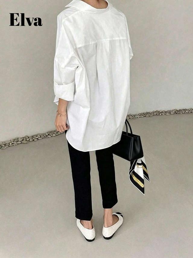 elva white loose fit long sleeve button up blouse