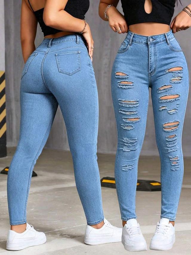 medium blue distressed skinny denim jeans