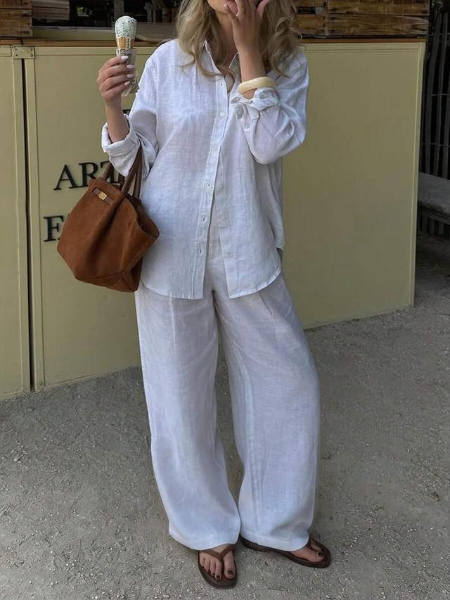 white cotton long sleeve collared shirt