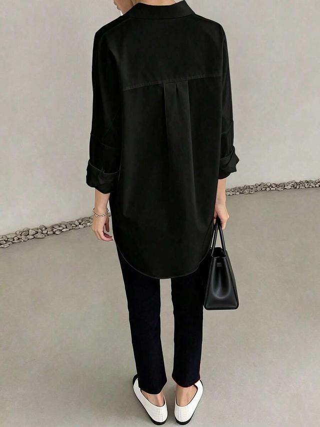 elva black loose fit long sleeve blouse