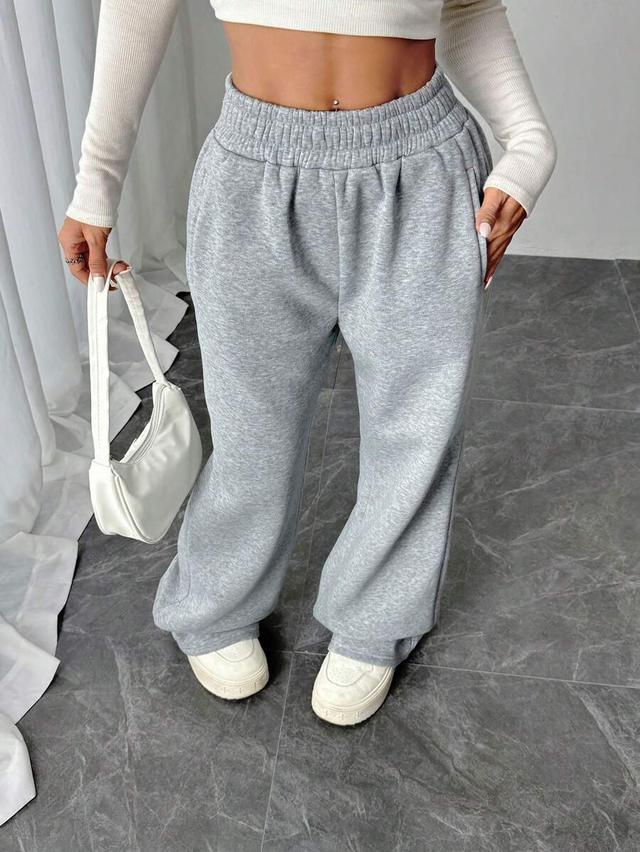 women casual solid color elastic waist flared sweatpants
