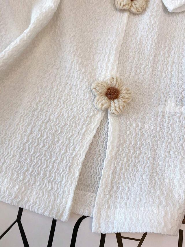 white textured knit t-shirt with 3d floral applique