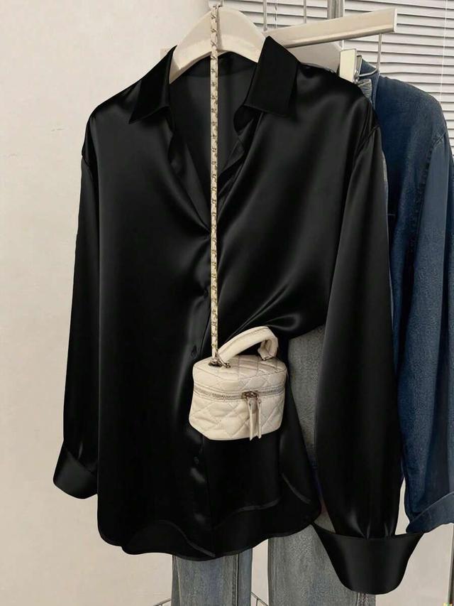 white women's solid black satin collared button-down shirt