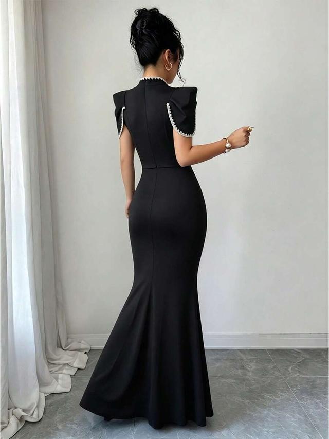 black embroidered frog button fishtail hem dress