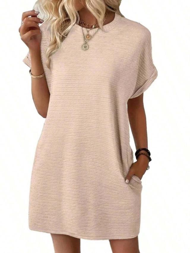 beige textured shift dress with side pockets