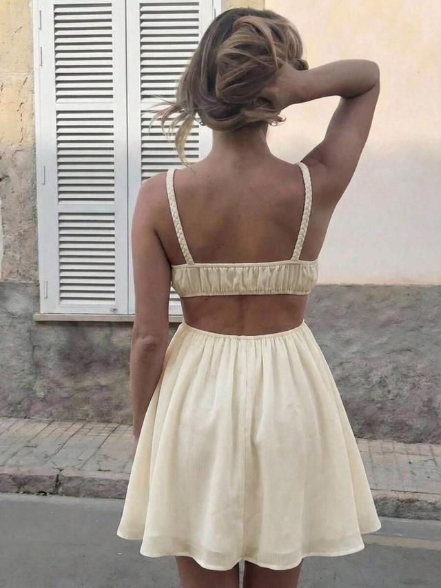 pale yellow embroidered cutout mini beach dress