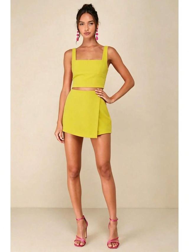 yellow square neck sleeveless crop top and matching skort