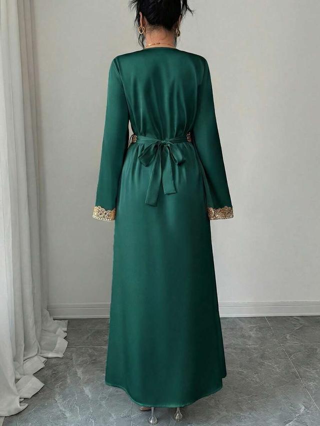 elegant emerald green v-neck long dress with gold lace