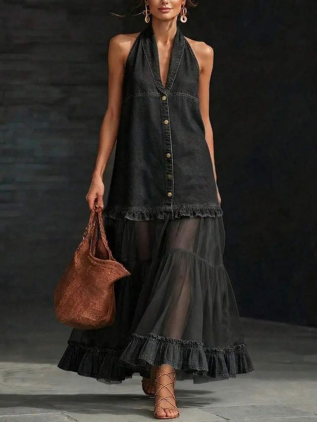 dark blue halter dress with tiered tulle skirt