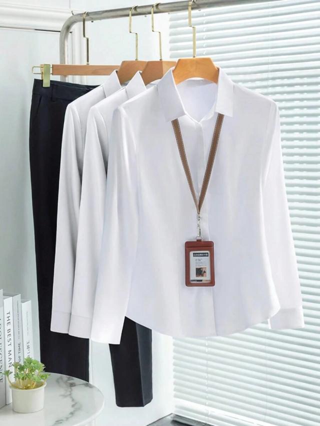 black professional long sleeve button-up shirt