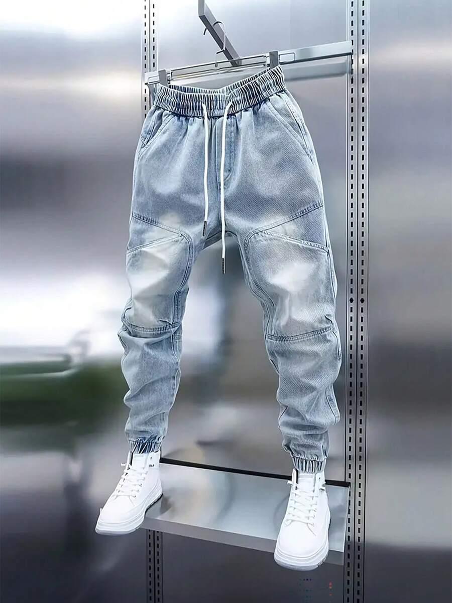 light blue men's light wash denim jogger pants with elastic waist