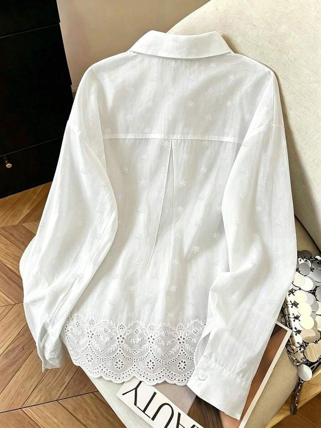 white embroidered cotton loose blouse with scalloped hem