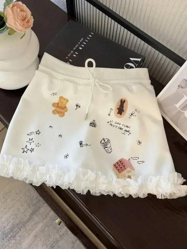 white vintage y2k denim mini skirt with applique print