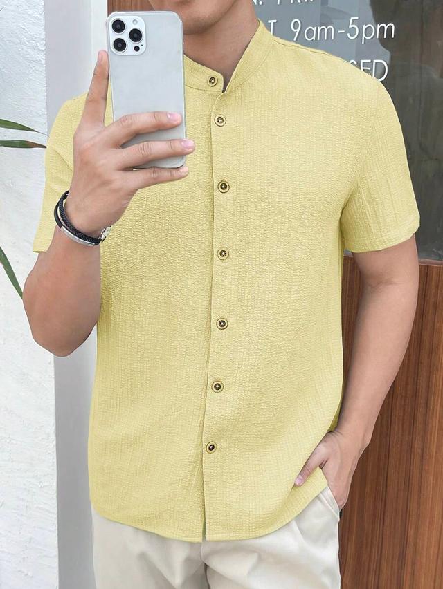 yellow textured short sleeve grandad collar button-up shirt