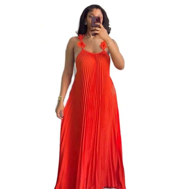 orange pleated maxi dress with floral strap detail