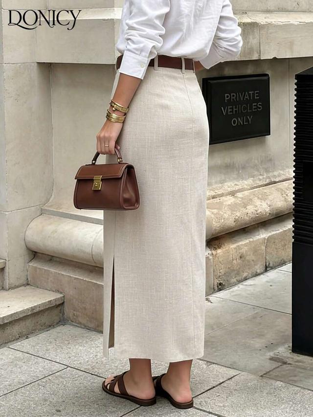 beige linen mid-length skirt with side slit