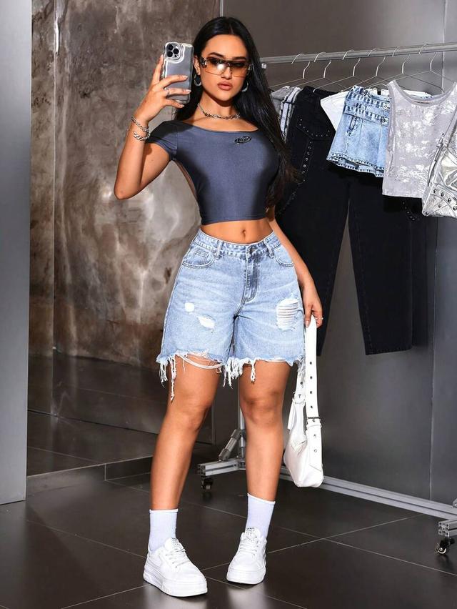silver grey distressed denim shorts with raw hem