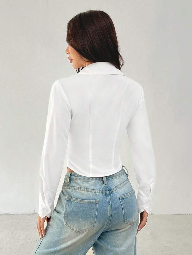 minimalist white cotton button-up blouse