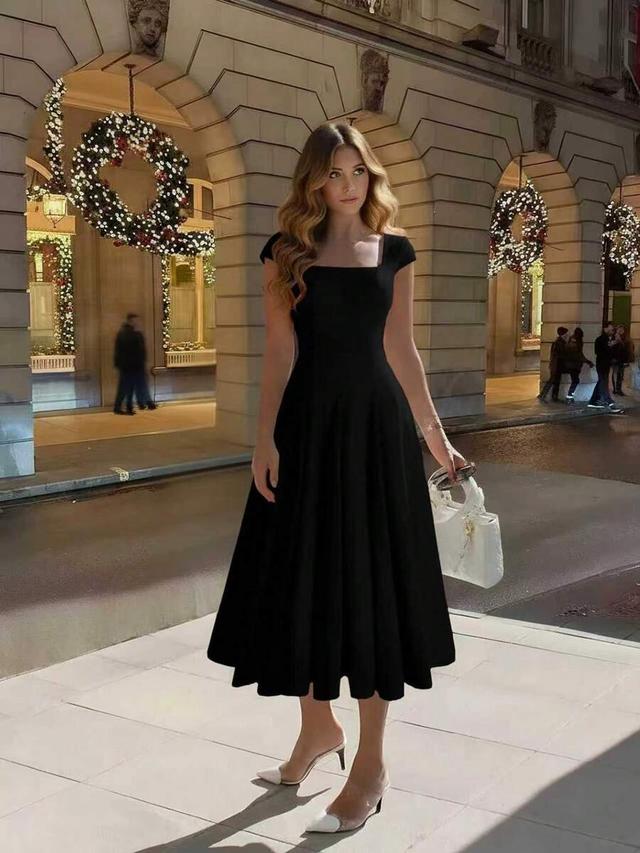 black women's solid black princess line elegant midi dress