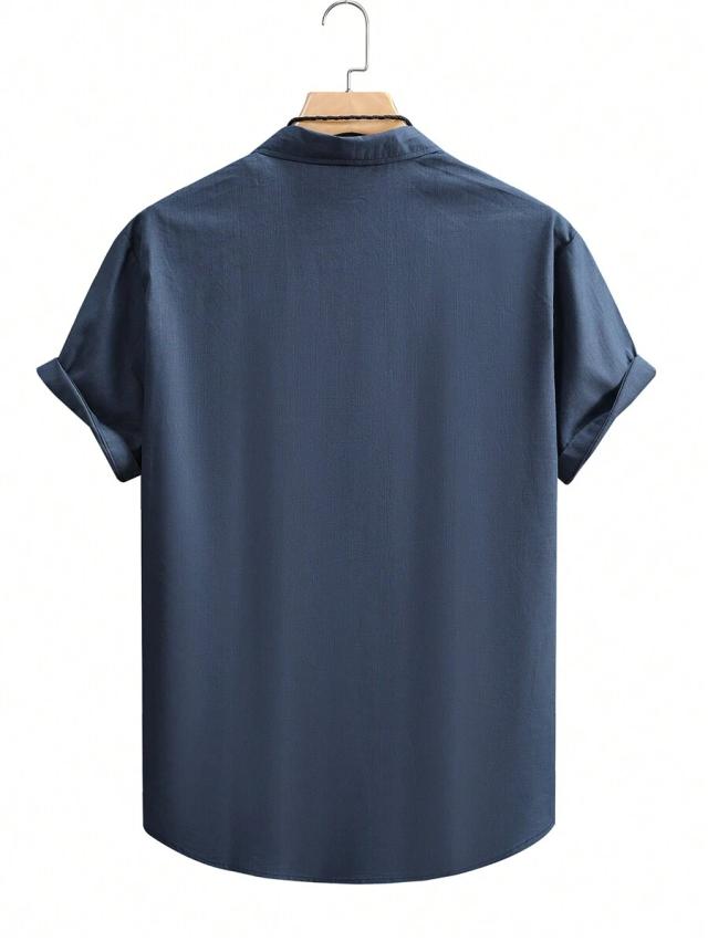 solid navy blue short sleeve button-up shirt