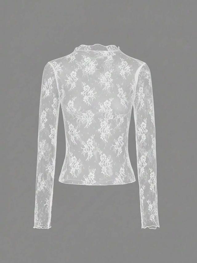 white and white floral lace long sleeve top