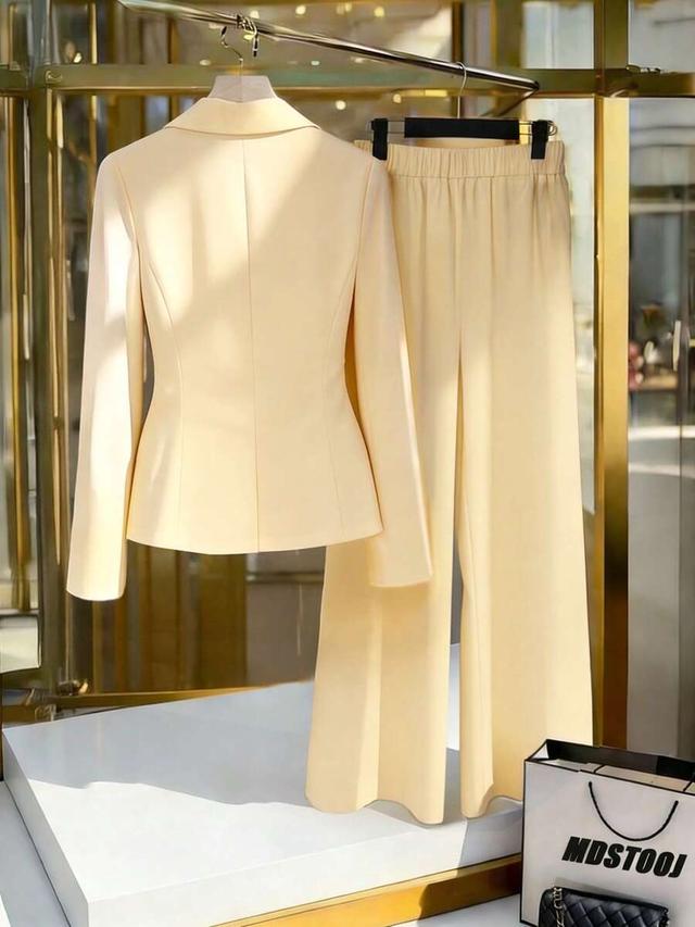 cream white gold button blazer and flared pants set