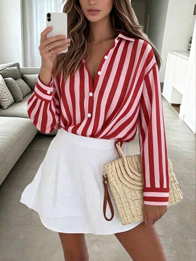 women's pink and red striped button-up shirt