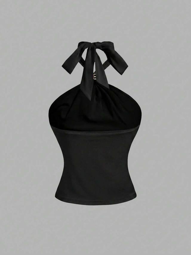 black three halter neck camisoles in black white and brown polka