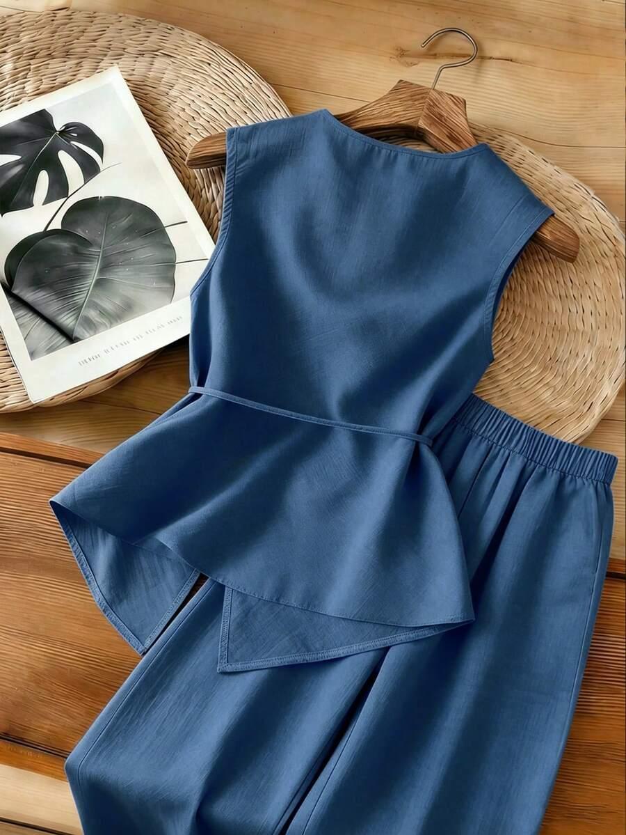 blue sleeveless asymmetrical top and wide leg pants set