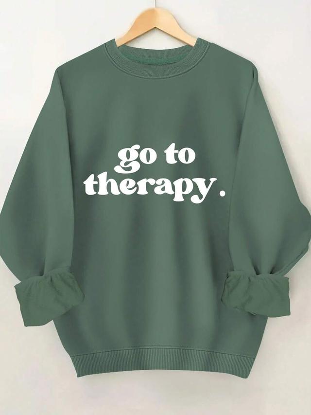 dark green crewneck sweatshirt with white graphic print